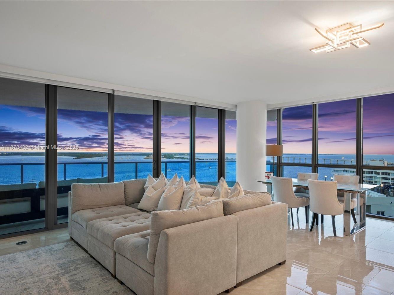The most desirable line at Jade Brickell! Clearing all neighboring buildings with unobstructed waterfront views, this renovated 1,878 SqFt residence showcases soaring 9 ft windows, a grand corner living room filled with light, and a private foyer. Designed for comfort and sophistication: 2 spacious bedrooms, 2 en-suite baths, powder room, dual walk-in closets, storage unit, and marble-tiled terrace. The kitchen boasts Brazilian Idelli cabinetry, Sub-Zero fridge and drawers, Wolf hood, Miele appliances, wine cooler, and custom bar with integrated lighting. Smart climate controls and built-out storage enhance your day to day. Jade Brickell is one of Miami’s most iconic and luxurious full-service buildings, offering world-class amenities, security, and a lifestyle you’ll love coming home to.