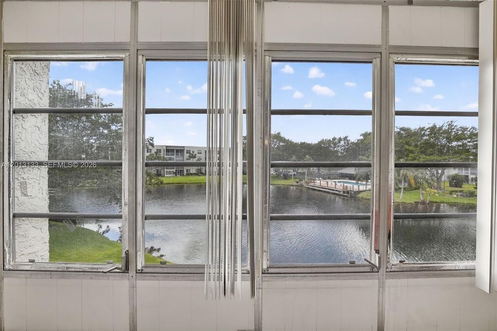 Photo of 9330 Lagoon Pl #307, Davie, FL 33324 (MLS # A12013133)
