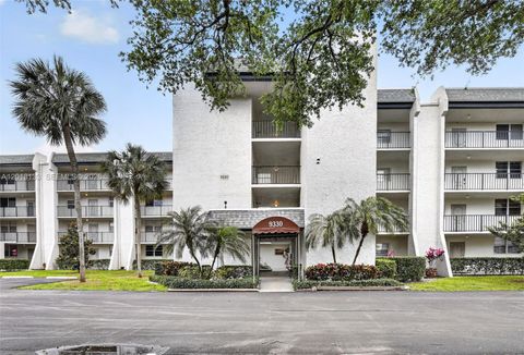 Photo of 9330 Lagoon Pl #307, Davie, FL 33324 (MLS # A12013133)