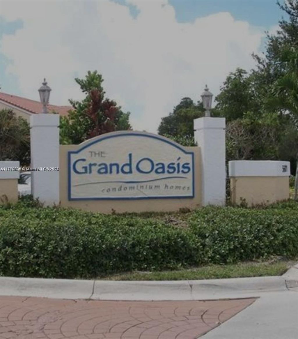 Photo of 5861 Riverside Dr #201A2, Coral Springs, FL 33067 (MLS # A11712038)