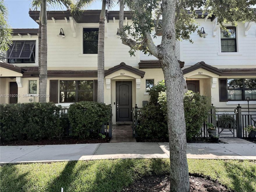 Rarely available turn-key townhouse located in highly desirable Pompano Beach! Wake up steps from the beach in this beautifully appointed and updated 3 bedroom 2.5 bath 9’ ceiling townhome. Convenient pull-down stairs provide easy access to the floored attic, maximizing your home’s storage capability. Nestled in the gated enclave Barefoot Beach Villas community on Ocean Boulevard. Enjoy the ease of a two car private garage, guest spots within the community and street parking. Serene courtyard is a shaded oasis anchored by towering, mature palms. Barefoot Beach Villas is distinguished as a low turnover community with lush vegetation, heated pool with tropical vibe chickee hut, and relatively low HOA fees for the area. Two luxury developments, Waldorf Astoria and Ritz Carlton Residences, are under development just down the street. Located in the heart of Pompano Beach’s vibrant dining, live music and cafe scene. Walk to local favorites including Beach House Pompano, Oceanic, and Lucky Fish for everything from tiki bar cocktails to oceanfront dining, plus How You Brewin’, a beloved coffee and breakfast spot just one block from the pier. Whether you’re looking for a primary residence or vacation retreat, this townhouse offers the lifestyle and location that is increasingly hard to find on the Florida coast.