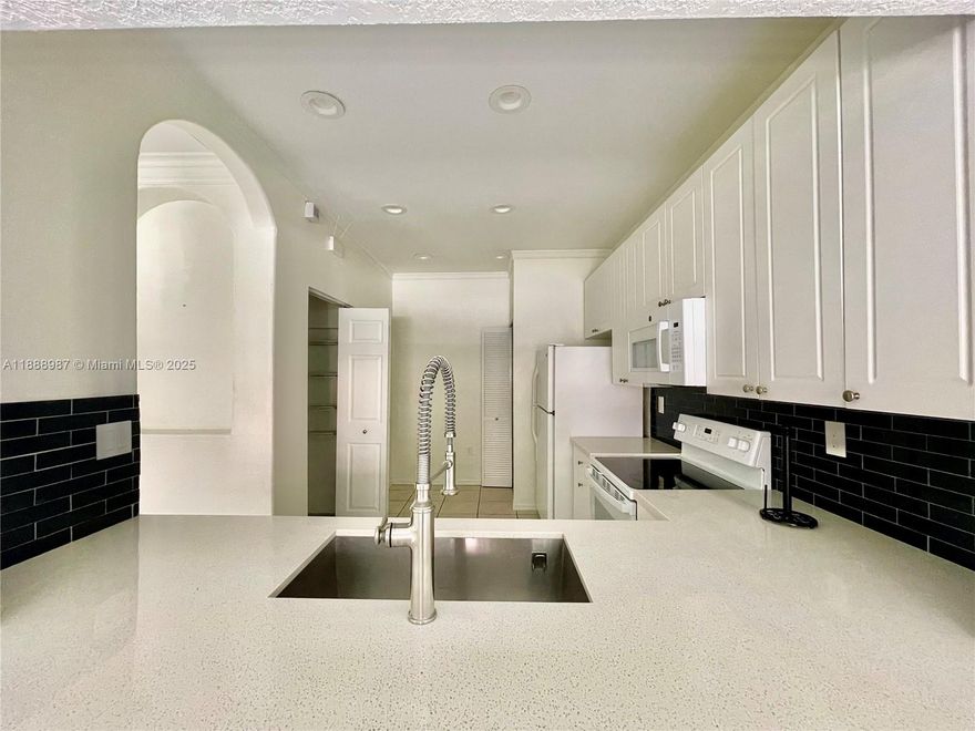 CLEAN AND GREAT TOWNHOME 2 MASTER BEDS- WITH OWN BATH AND 1/2 BATH WITH NATURAL LIGHT, UPGRADED KITCHEN WITH STAINLESS STEEL APPLIANCES, FULL SIZE WASHER/DRYER, CERAMIC TILE FIRST FLOORS AND WOOD FLOORS ON THE SECOND FLOOR , WITH HIGH CEILINGS IN THE DESIRABLE GATED COMMUNITY OF MERRICK PRESERVE WITH POOL, VERY SAFE AND RESIDENTIAL NEIGHBORHOOD CLOSE TO SCHOOLS, GREAT LOCATION WITH EASY ACCESS TO SHOPPING, RESTAURANTS AND THE SAWGRASS AND TURNPIKE. WATER NOT INCLUDED. YOU HAVE TO SEE IT !!! QUESTIONS ONLY BY TEXT MESSAGE CREDIT SCORE +650