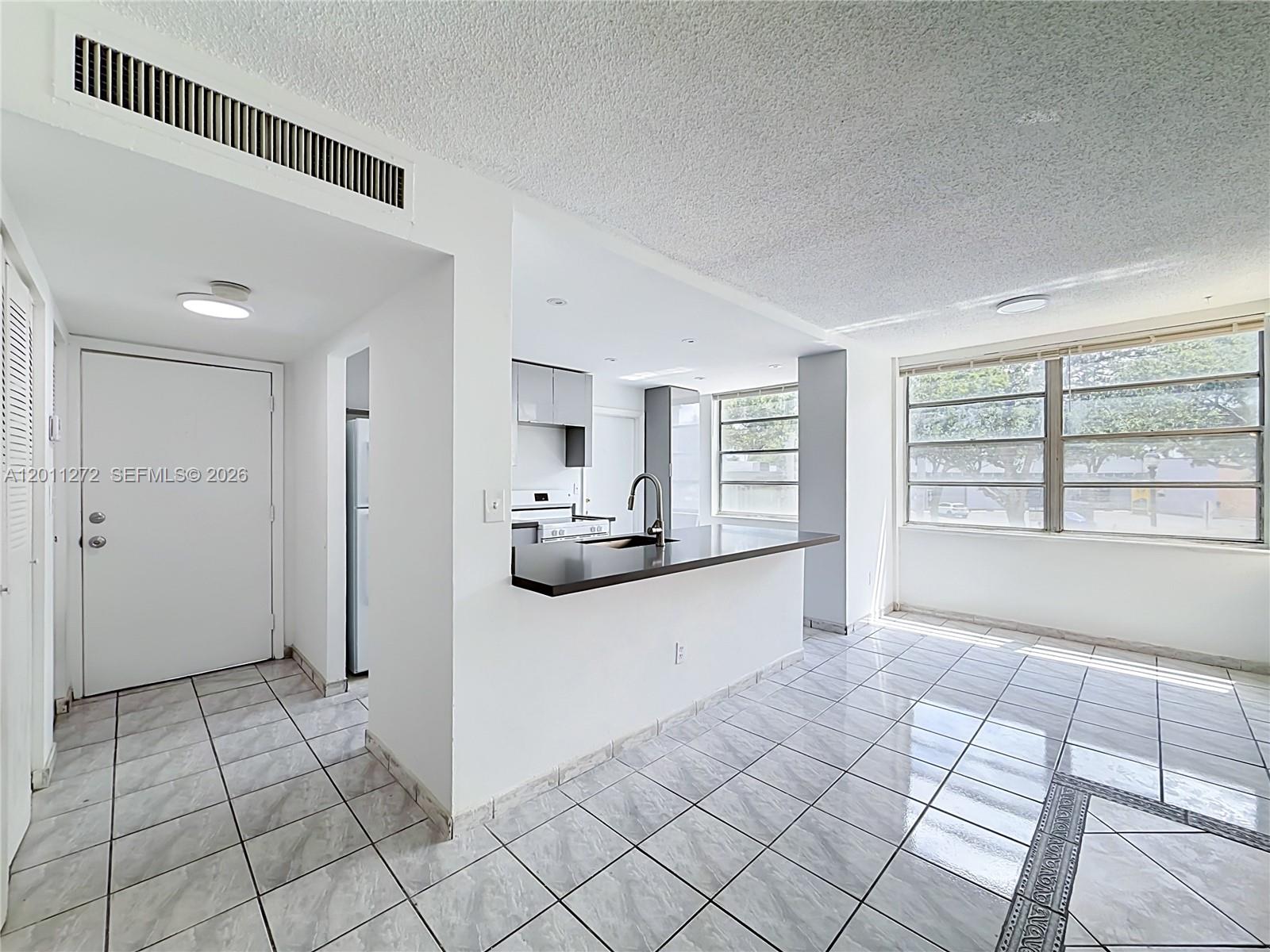THREE SEASONS CONDO BLDG - Residential