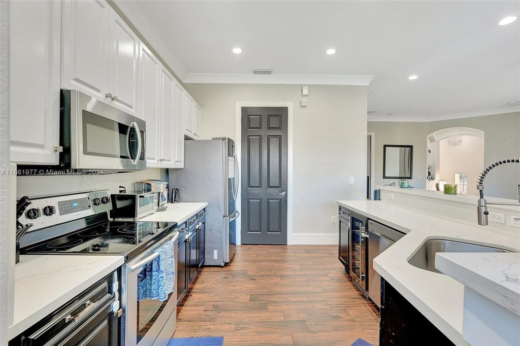 Photo of 8023 NW 127th Ln #4-F, Parkland, FL 33076 (MLS # A11661977)