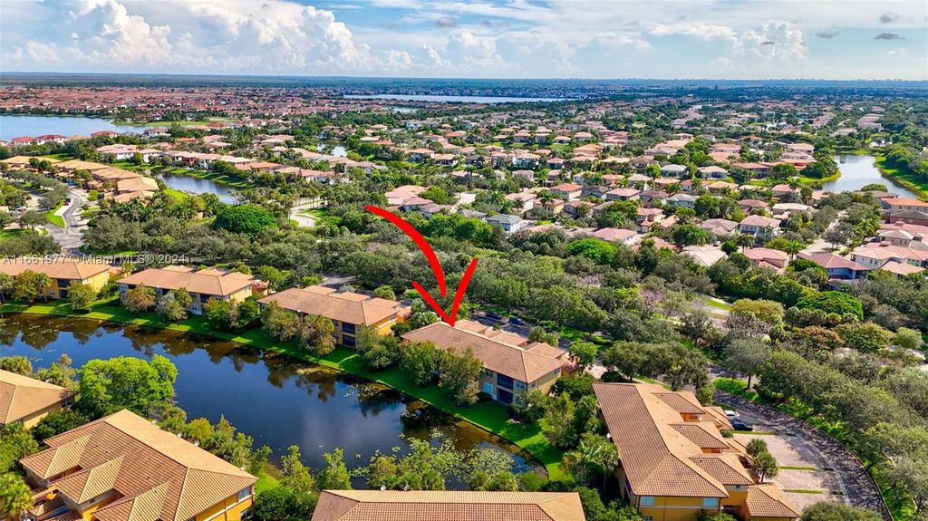Photo of 8023 NW 127th Ln #4-F, Parkland, FL 33076 (MLS # A11661977)
