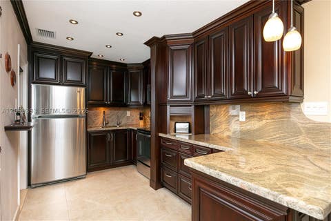Photo of 3135 S Ocean Dr #227, Hallandale Beach, FL 33009 (MLS # A12058393)