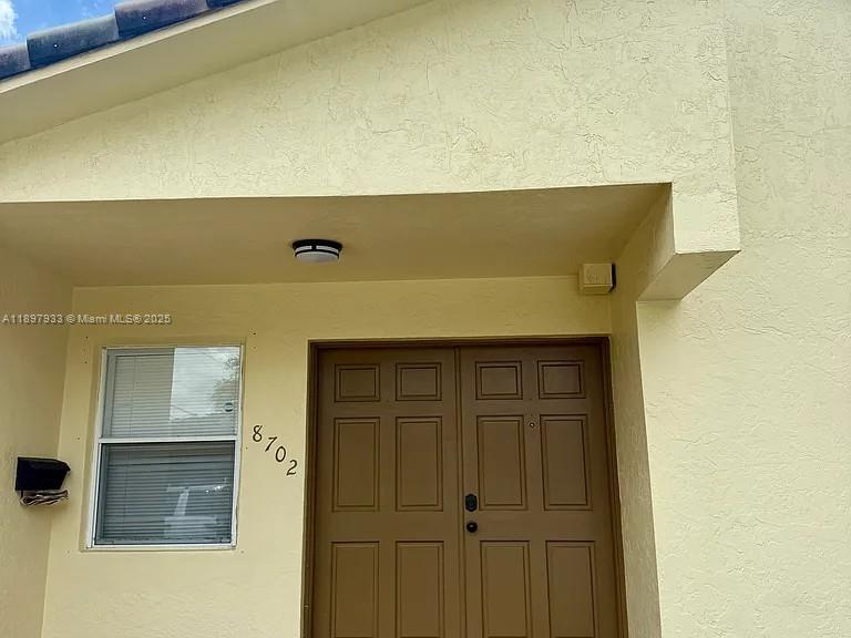 Amazing Coral Park Location, right in the heart of Westchester area. This 2 bedrooms and 2 baths Duplex is on the corner of 87th Ave and S.W 32nd Street. A short walk to Cristopher Columbus High Schools, and St. Brendan High Schools. Parking in front of the unit for 3-4 cars, and NO association fee. Included in the rental is the yard maintenance, monitored alarm system, and garbage pickup. Come see this unit before is gone! We present all Offers.