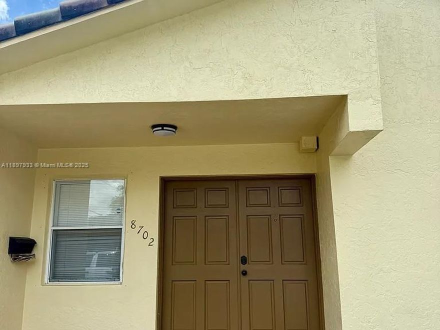 Amazing Coral Park Location, right in the heart of Westchester area. This 2 bedrooms and 2 baths Duplex is on the corner of 87th Ave and S.W 32nd Street. A short walk to Cristopher Columbus High Schools, and St. Brendan High Schools. Parking in front of the unit for 3-4 cars, and NO association fee. Included in the rental is the yard maintenance, monitored alarm system, and garbage pickup. Come see this unit before is gone! We present all Offers.