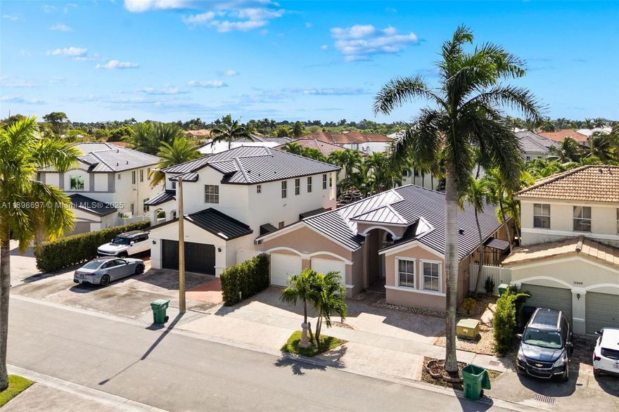 Beautifully updated 3-bedroom, 2.5-bath home in a desirable Miami neighborhood. Features a brand-new roof, remodeled kitchen with modern finishes, new A/C, and high ceilings that fill the home with natural light. Spacious 2-car garage. Move-in ready and conveniently located near major highways, shopping, and dining.