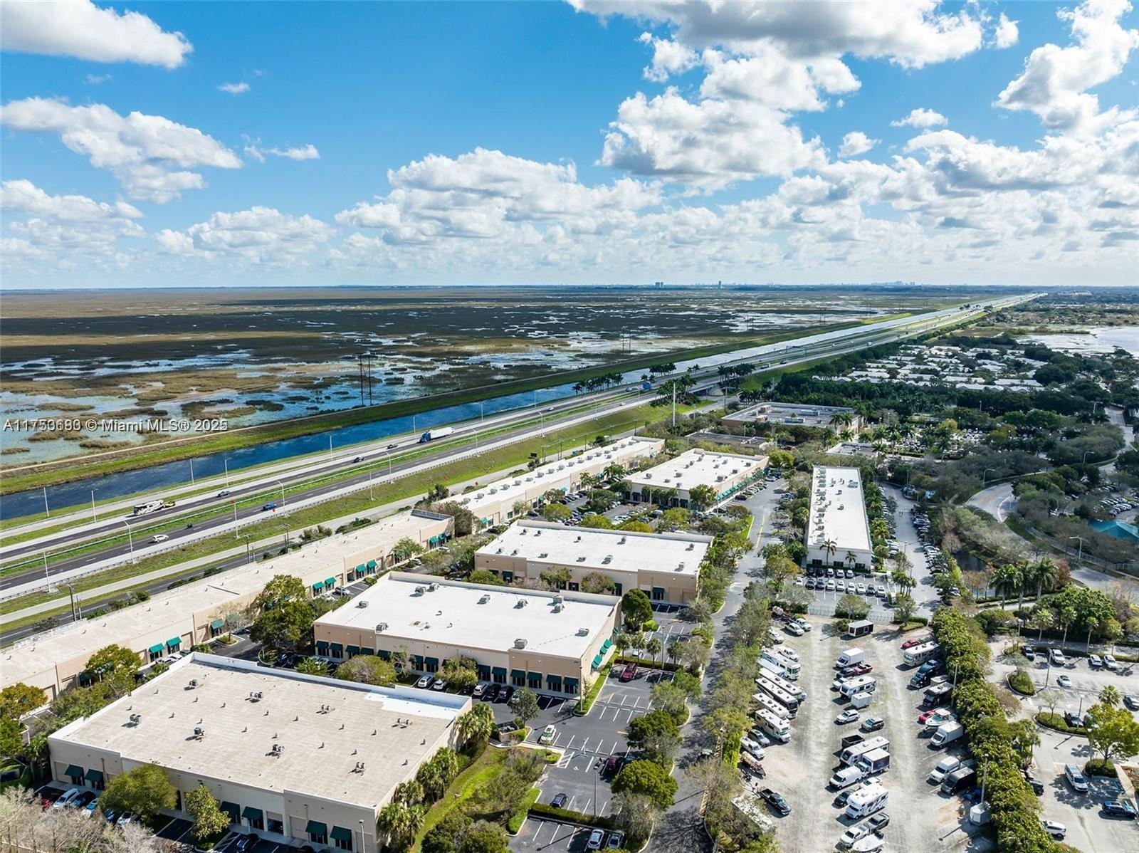 1,534 Sq Ft Warehouse & Office Space in prime Weston location. Close to all major highways: I-75 North & South, Sawgrass Expressway & I-595. Street level 13' bay door provides access to the warehouse. Volume 20' ceilings in warehouse. No retail permitted per association rules and regulations. Perfectly maintained commercial condo. Rented until 2027.