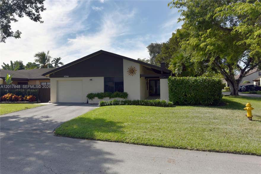 The prettiest, corner house in The Crossings! Beautiful white porcelain floors, nicely updated bathrooms, lots of closet space, ample kitchen with lots of cabinet storage, stainless steel appliances, granite counters, extra ceiling insulation, pod lights, extra large family room, all impact windows and doors, new plantation shutters, woven wood shade in living room window, solar roller shades and panels, burglar and fire alarms, front and back security cameras, new front wood siding, epoxy floor and utility sink in clean garage, tankless water heater, huge back patio with sprinkler system and plenty of room for a pool and gazebo. This house is turn-key and ready for the pickiest buyer! Low HOA fee with great management. Magnificent clubhouse and recreation areas. Great schools, stores and restaurants very close by. Easy access to turnpike. Easy to show. Dining room chandelier not included.