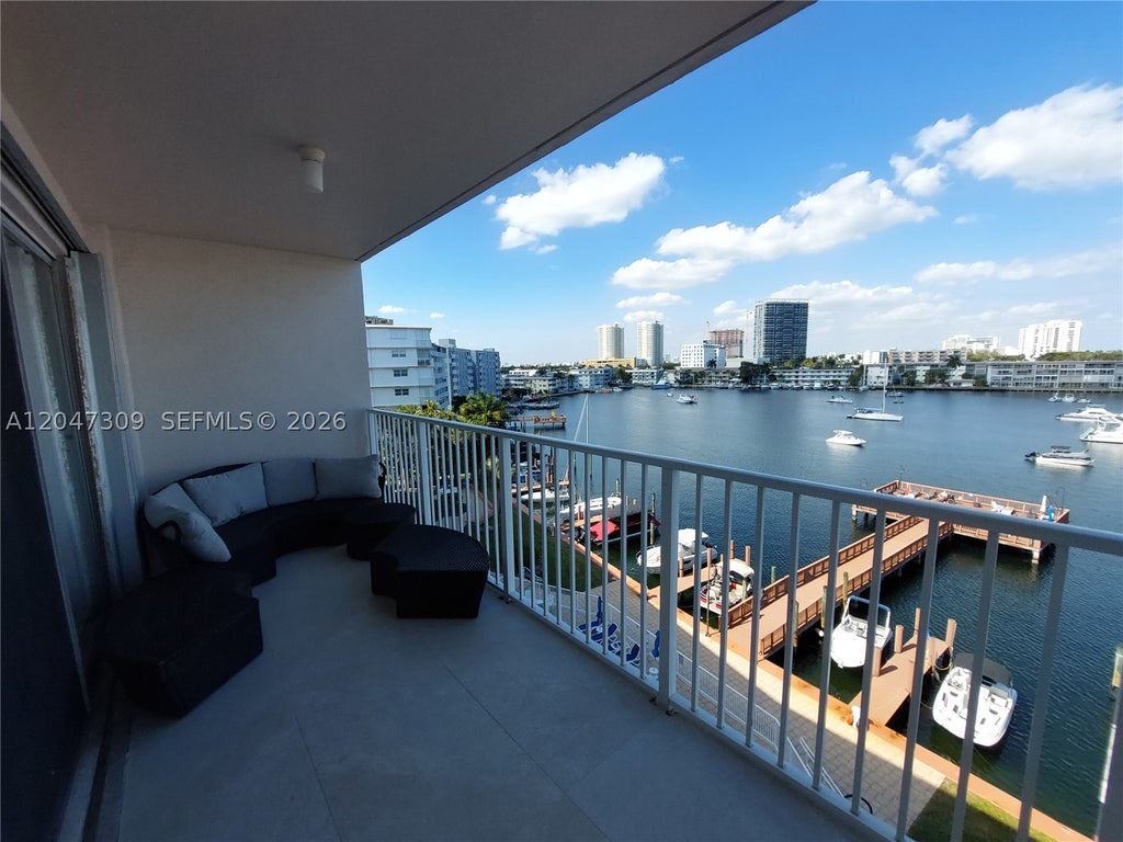 Photo of 400 Golden Isles Dr #47, Hallandale Beach, FL 33009 (MLS # A12047309)