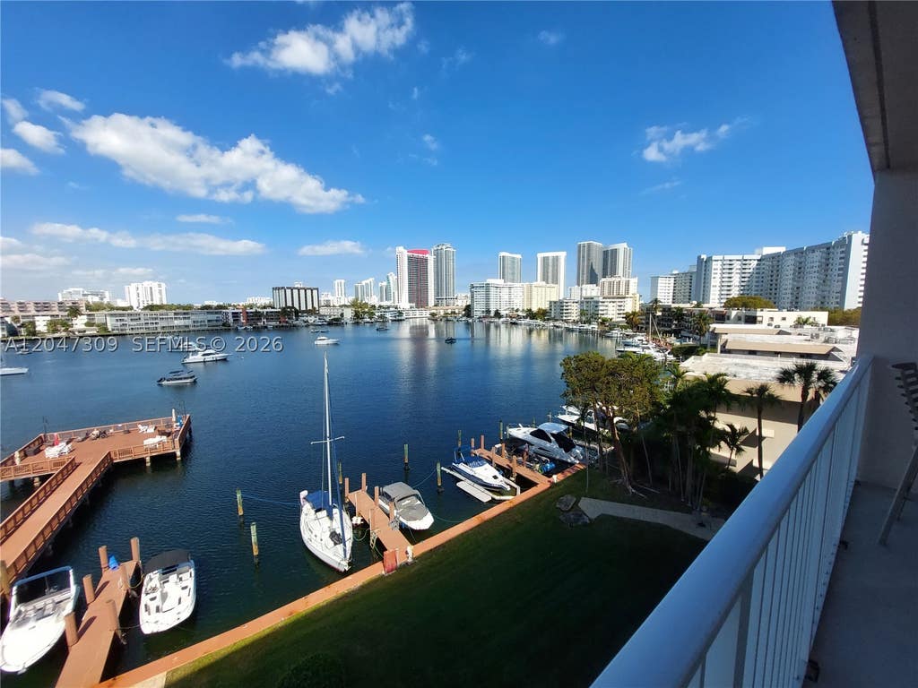 Photo of 400 Golden Isles Dr #47, Hallandale Beach, FL 33009 (MLS # A12047309)