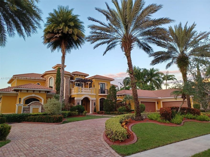 Magnificent two story estate located in the prestigious community of Windmill Reserve on one of the best lake front lots of this community. This stunning home has 10,789 total square feet and features six luxury bedrooms and seven and a half custom baths.
From the moment you walk through the arched front doors, you will see that no detail has been overlooked. This custom home has every luxurious detail imaginable, starting with 
the impressive marble floors in living areas and natural wood floors in bedrooms, beautiful built ins, on demand fireplace, surround sound system all over the house with indoor/outdoor speakers, and a state of the art Savant and Crestron smart home technology that by using an iPad or smart phone controls the audio, TVs, shades, fans, thermostats, etc.