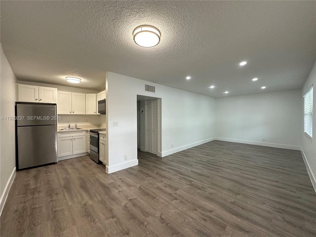 Photo of 2500 Johnson St #14, Hollywood, FL 33020 (MLS # A11929237)