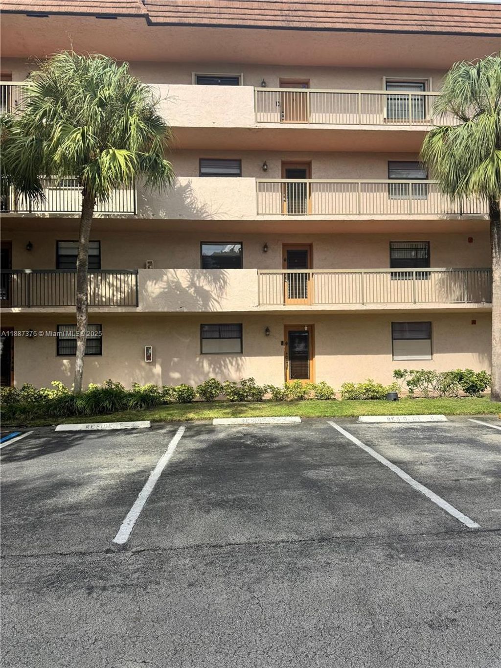 Photo of 4960 E Sabal Palm Blvd #203, Tamarac, FL 33319 (MLS # A11887376)