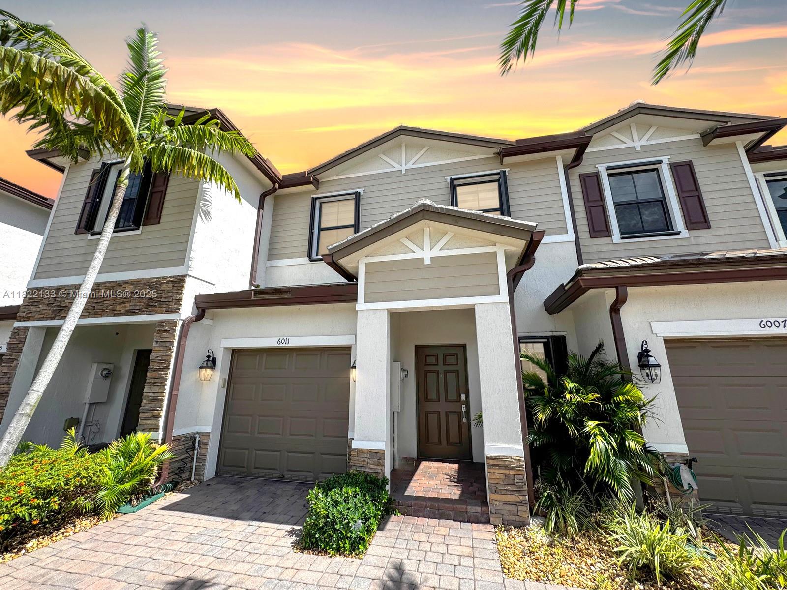 Welcome to this beautiful newer construction 3 bed, 2.5 bath townhome in Davie. Light and bright home features a modern kitchen with stainless appliances perfectly positioned to interact with the family room. The spacious upstairs primary suite has tray ceiling detail, walk-in closet, and en-suite bath with two sinks. Enjoy a dedicated laundry closet upstairs, 1 car garage and driveway fits 2 cars for ample guest parking right in front of the home. Full accordion shutters. A private fenced yard is perfect for relaxing and outdoor dining. Enjoy the close proximity to the pond and walk path for a nice evening stroll. Convenient location offers proximity to NSU, BC, I-595, the Turnpike, Hard Rock, dining, and shops.