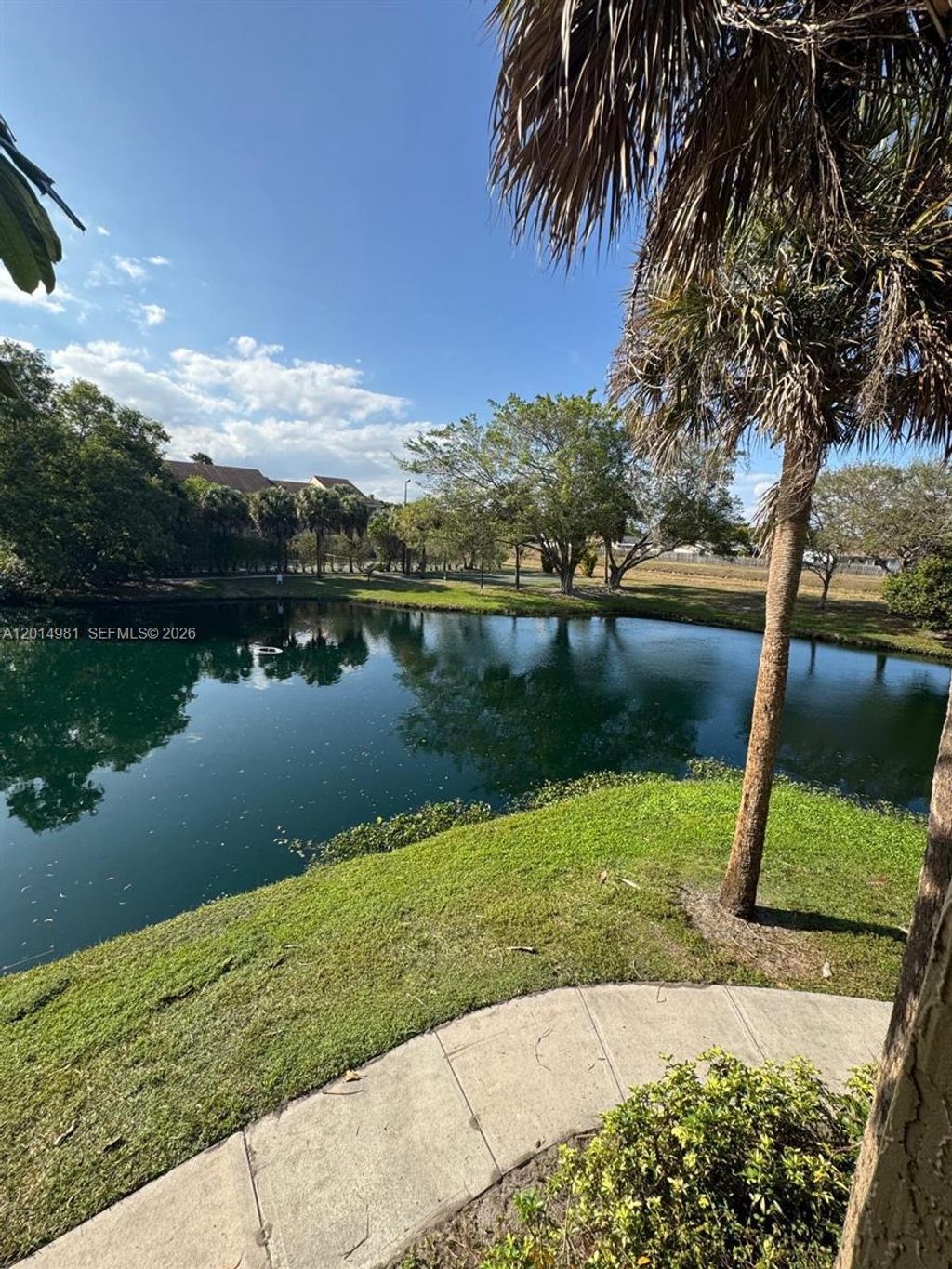 Photo of 9999 Summerbreeze Dr #620, Sunrise, FL 33322 (MLS # A12014981)