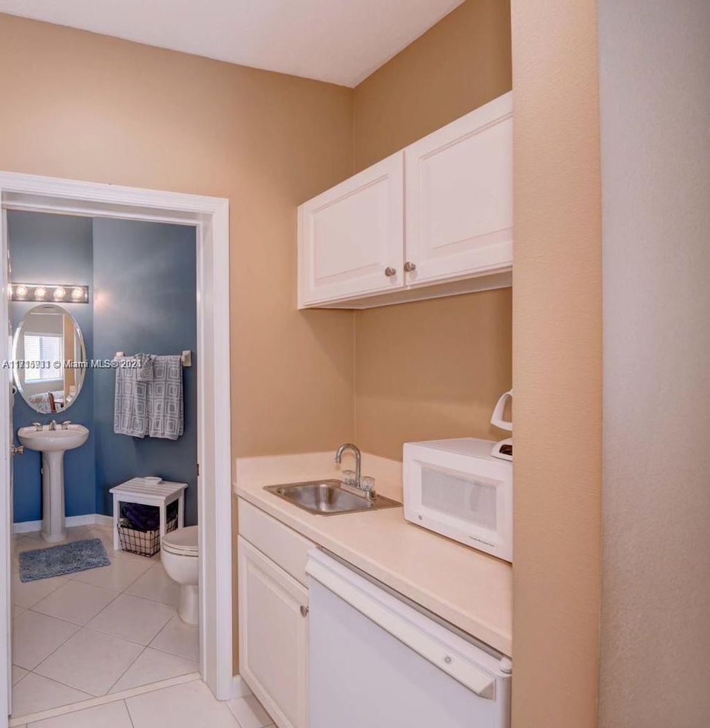 Photo of 8910 Sandshot Ct #B, Port Saint Lucie, FL 34986 (MLS # A11715931)