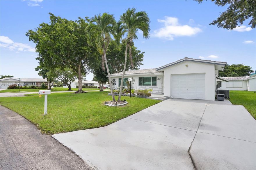 HIGH DEMAND – WON'T LAST! Fully renovated 2/2 Admiral Model on a corner lot with an open floor plan. Features impact windows & doors, custom kitchen with stainless steel appliances, granite countertops, updated bathrooms with a spa shower, French doors to a screened patio, and tile flooring throughout. Recent updates: A/C (2019), water heater (2021), roof (2016). Located in a vibrant 55+ community with an active clubhouse, pools, fitness center, and more! Association fee includes HD TV, internet