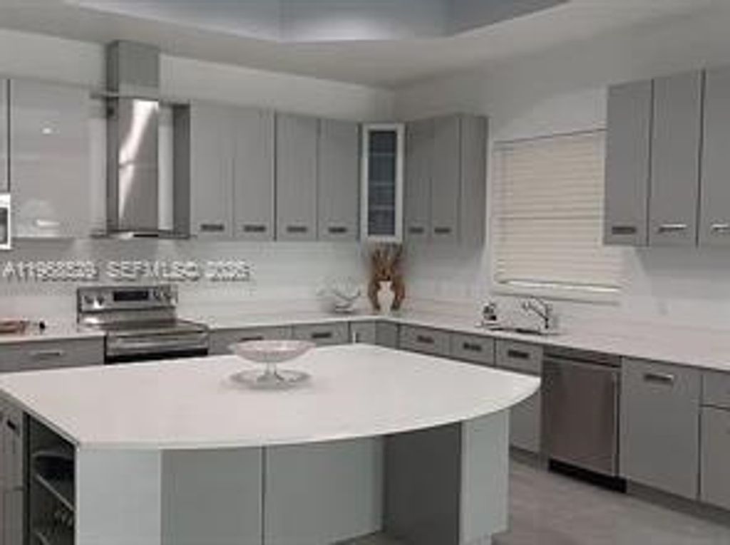 Photo of 1711 SE Airoso Blvd, Port St Lucie, FL 34984 (MLS # A11968529)