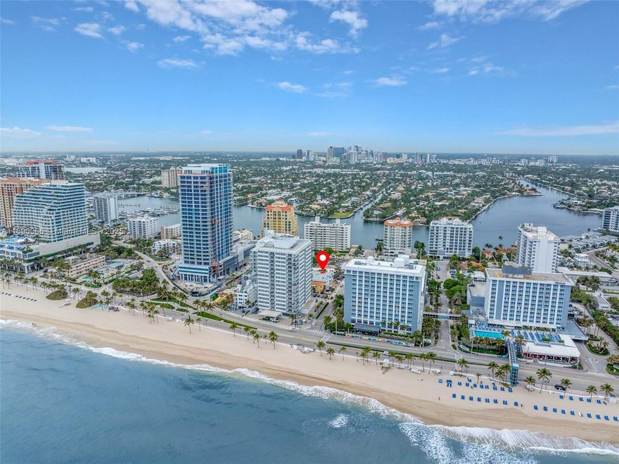 This exceptional property offers a prime location directly across from Las Olas Beach in Fort Lauderdale, providing access to the beautiful Fort Lauderdale central beach just steps away. The property features 8,973 square feet of well-designed space across two stories, ensuring ample room for any purpose. Inside, you'll find meticulously crafted interiors that seamlessly blend modern elegance with coastal charm, creating a warm and inviting atmosphere. The property includes ten designated parking spaces and sits on a generous 12,500 square foot lot, encompassing two adjacent buildings. Each room comes with a fully equipped kitchen, TV, high-speed internet, and central air conditioning. Additionally, guests can enjoy the on-site pool and jacuzzi, adding to the property's overall appeal.
