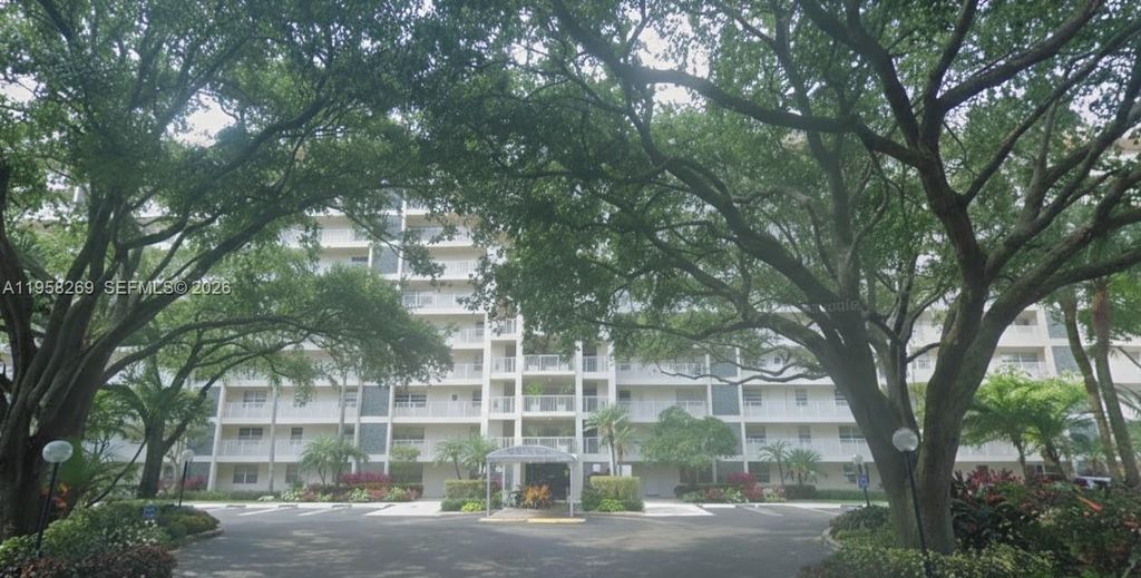 Photo of 3520 Oaks Way #402, Pompano Beach, FL 33069 (MLS # A11958269)