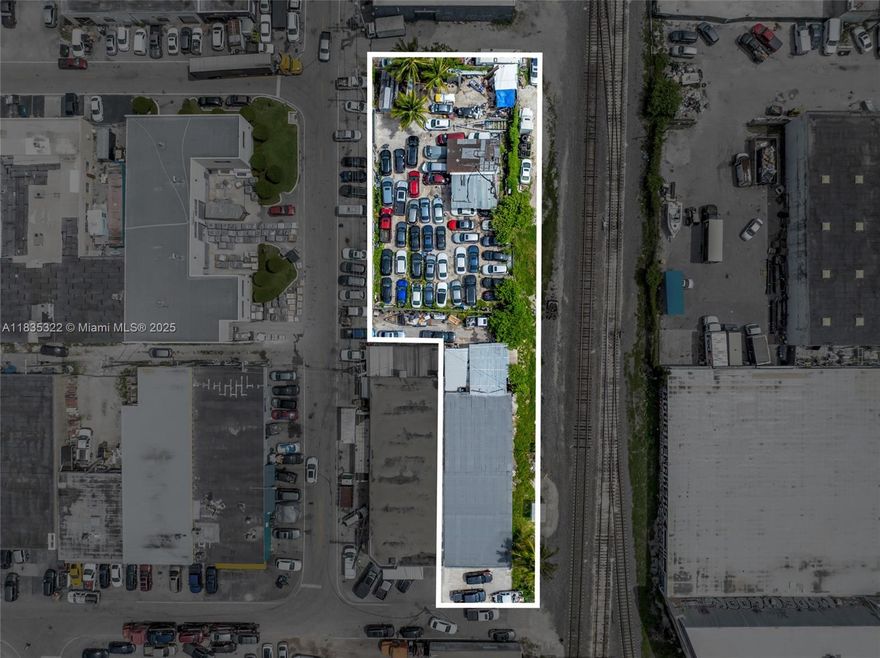 BEING SOLD TOGETHER OR SEPARATE WITH FOLIO: 04-3108-002-2730 Presenting an exceptional assemblage opportunity with combined frontage along the full length of the adjacent railroad line, totaling 18,629 SF across 1109 E 23rd Street and 2363 E 11th Avenue. The property at 1109 E 23rd Street features a 3,800 SF warehouse situated on a 5,272 SF lot, boasting 12' ceiling heights, two personnel street-level doors, and two bay doors measuring 12'W x 10'H and 10'W x 10'H respectively. The building includes 252 SF of office space, a 14' x 18' private office, and 3,548 SF of open warehouse area, currently operating as an auto body shop.