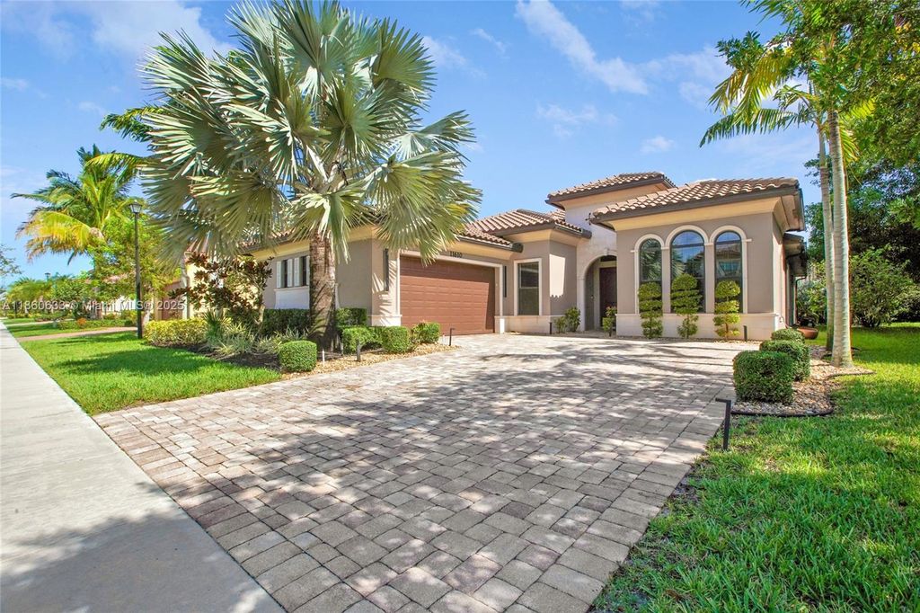 Photo of 11610 NW 83rd Way, Parkland, FL 33076 (MLS # A11860633)
