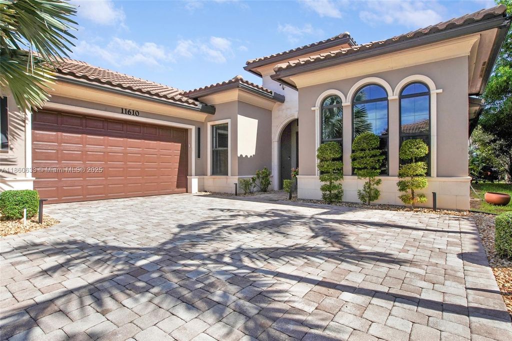 Photo of 11610 NW 83rd Way, Parkland, FL 33076 (MLS # A11860633)