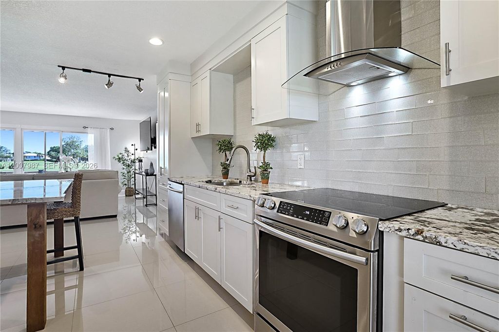 Photo of 9169 SE Riverfront Ter #M, Jupiter, FL 33469 (MLS # A12007987)