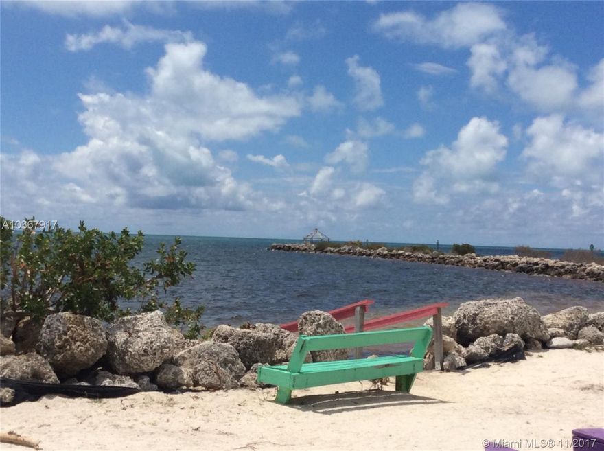 Great Spacious Condo in Key Largo.  Gated Community. This 2 Bedroom/2 Bath condo invites relaxation.  It is in Pristine condition.  You can enjoy the second floor terrace or the patio view to the quiet lagoon and pool area. Kawama Yacht Club offers pools, tennis courts, playground, marina with direct ocean access, dry dock and so much more.