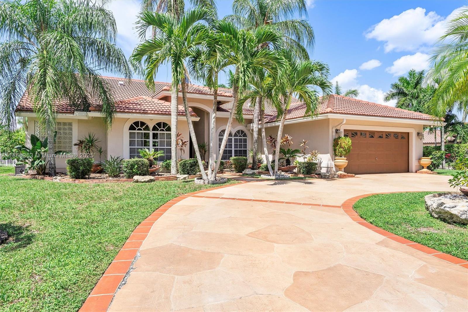 Beautiful 4-Bed, 2 Full & 2 Half Bath single-story home in gated Carriage Pointe Estate. Set on a large corner waterfront lot with lush landscaping, this residence offers an open layout with formal dining, living & family rooms. Gourmet kitchen features granite counters & stainless steel appliances. Light-filled interiors boast porcelain floors, laminate in bedrooms, custom closets, and upgraded baths. Primary suite includes a sitting area, dual sinks, Roman tub & shower. Screened, heated pool with covered patio, built-in BBQ bar & lake views. New A/C 2023, roof 5 yrs, water heater 2024. Large laundry & 2-car garage. Close to Sawgrass, schools, dining & parks. Mortgage savings may be available for buyers of this listing.