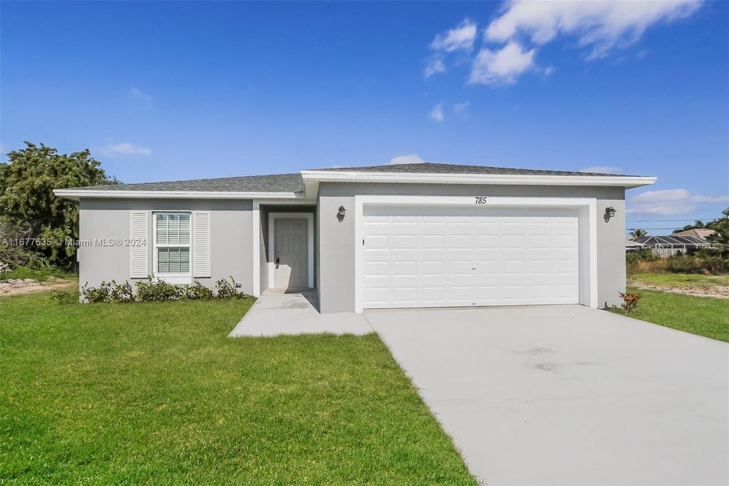 Photo of 785 SW Sardinia Ave, Port Saint Lucie, FL 34953 (MLS # A11677635)