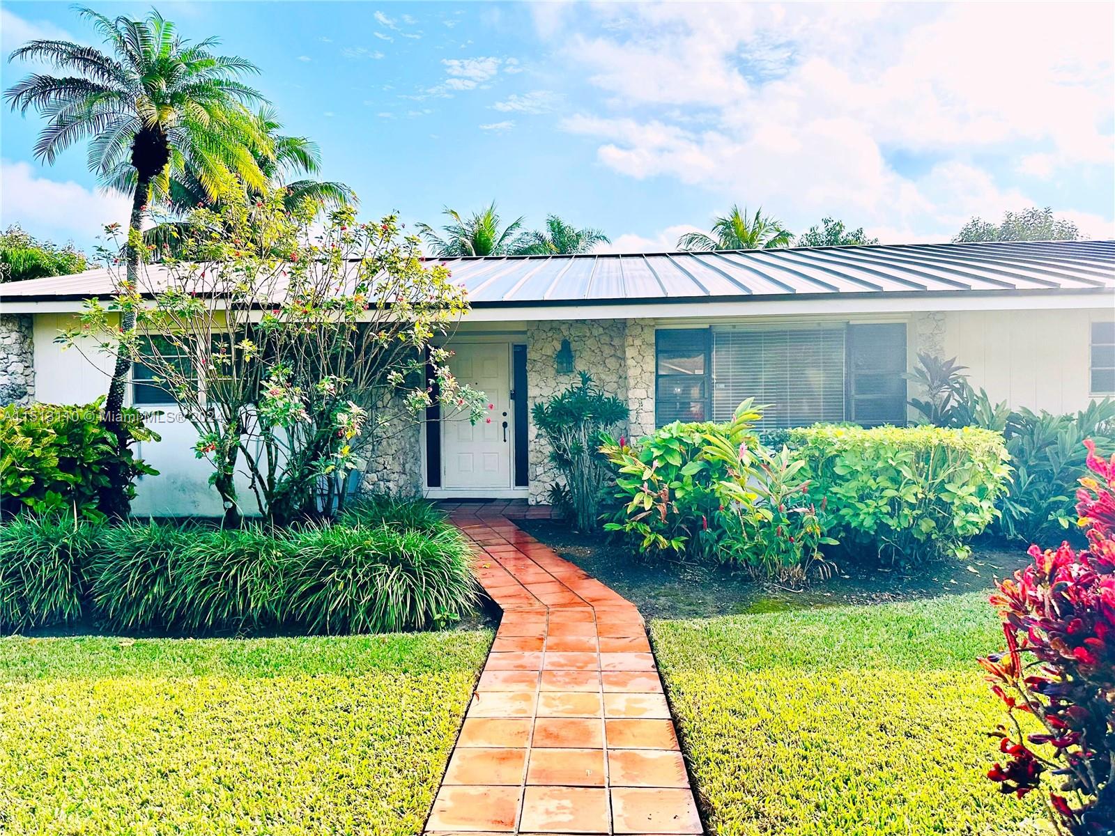 RARE OPPORTUNITY! Beautiful Pinecrest home w/4 bedrooms & 2 full baths on a no-thru street. Located on a 1/2 Acre lot with extra wide canal in the back. Canal is perfect for fishing or enjoying a small boat ride. Huge kitchen with extra-long island, breakfast nook and two large windows overlooking the pool, canal and lush landscaping. Glass doors throughout house with beautiful views of the outdoors. New roof installed 2021. Great layout with a lot of potential! House is great for both primary use and/or investment. MUST SEE.