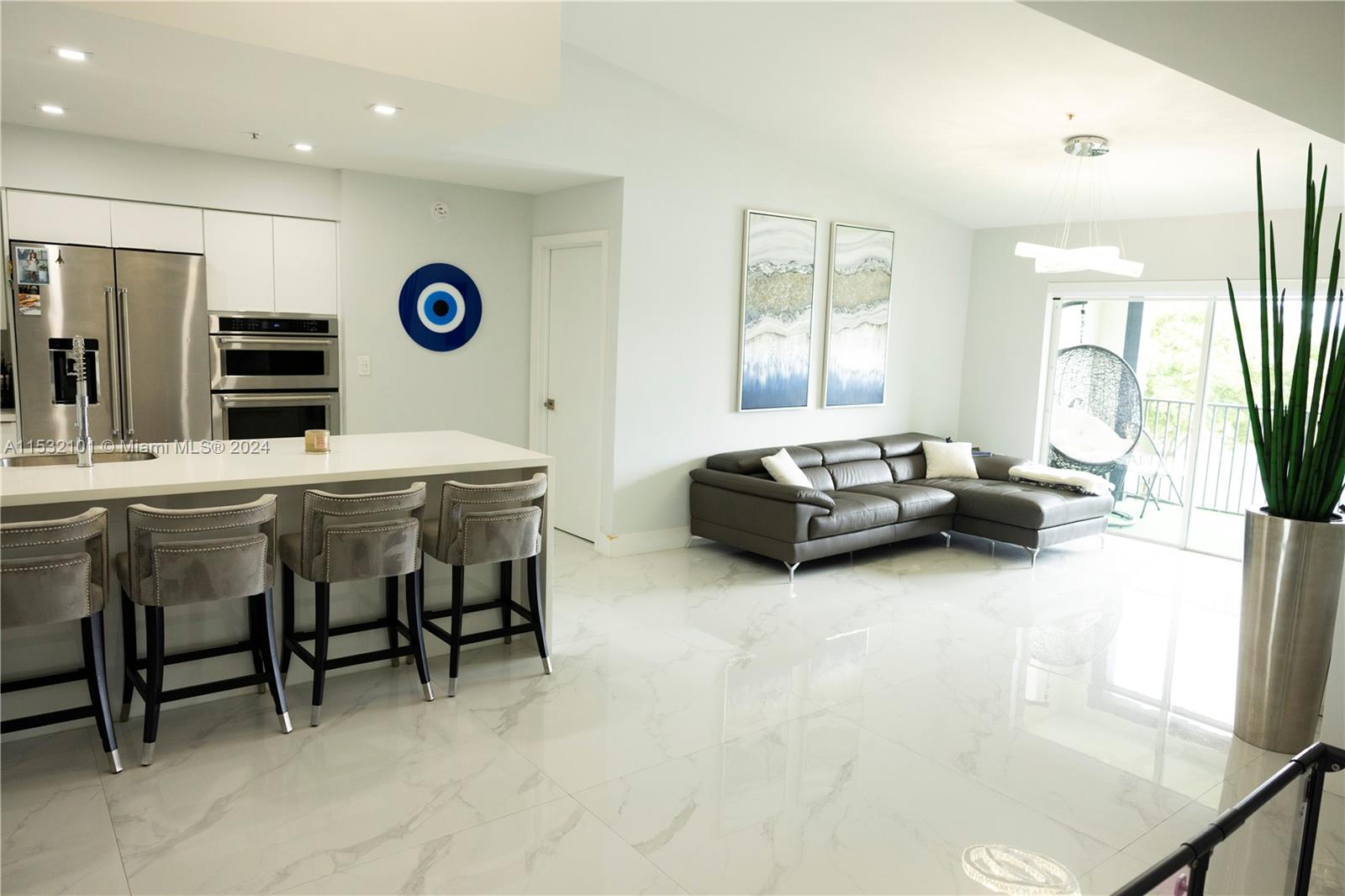Fully remodeled, stunning 2/2 apartment in the heart of Doral! Close to major highways, great schools, shopping centers and restaurants. This beautiful corner unit offers an open floor plan with high ceilings, porcelain tile floors throughout, new plumbing/electricity, kitchen with custom cabinetry and quartz counters, walk-in closet and lake views. Amenities also include the Enclave Clubhouse, gym, pool, hot tub, tennis courts and children's playground. Contact me today for a showing and make this your new home!