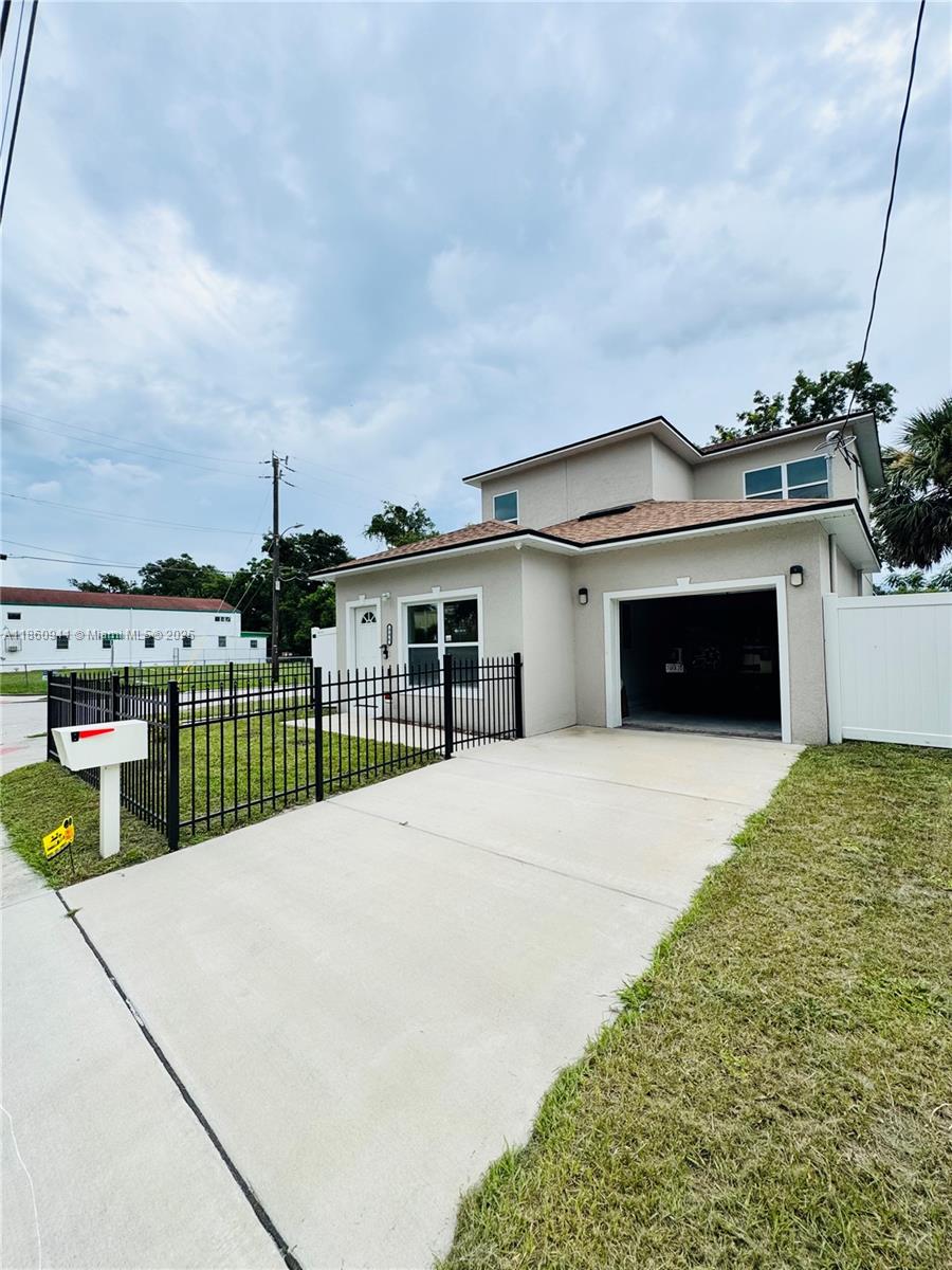 Welcome to this stunning 3-bedroom, 2.5-bath home located in the heart of Downtown Orlando, now available for rent. Built in 2024, this modern residence offers an open and spacious floor plan with high ceilings, abundant natural light, and stylish finishes throughout. The gourmet kitchen features stone countertops and a sleek layout that flows seamlessly into the living and dining areas, perfect for both daily living and entertaining. All bedrooms are located upstairs, providing comfort and privacy. Situated on a corner lot with no HOA, this property offers both convenience and flexibility. For added peace of mind, the home comes equipped with a camera security system. Don’t miss this opportunity to rent a modern home close to everything Orlando has to offer.
