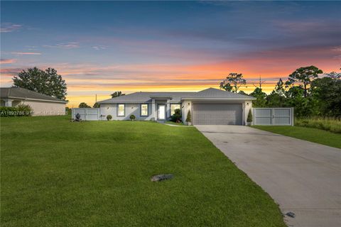 Photo of 1023 Arboreal, Lehigh Acres, FL 33974 (MLS # A11892786)