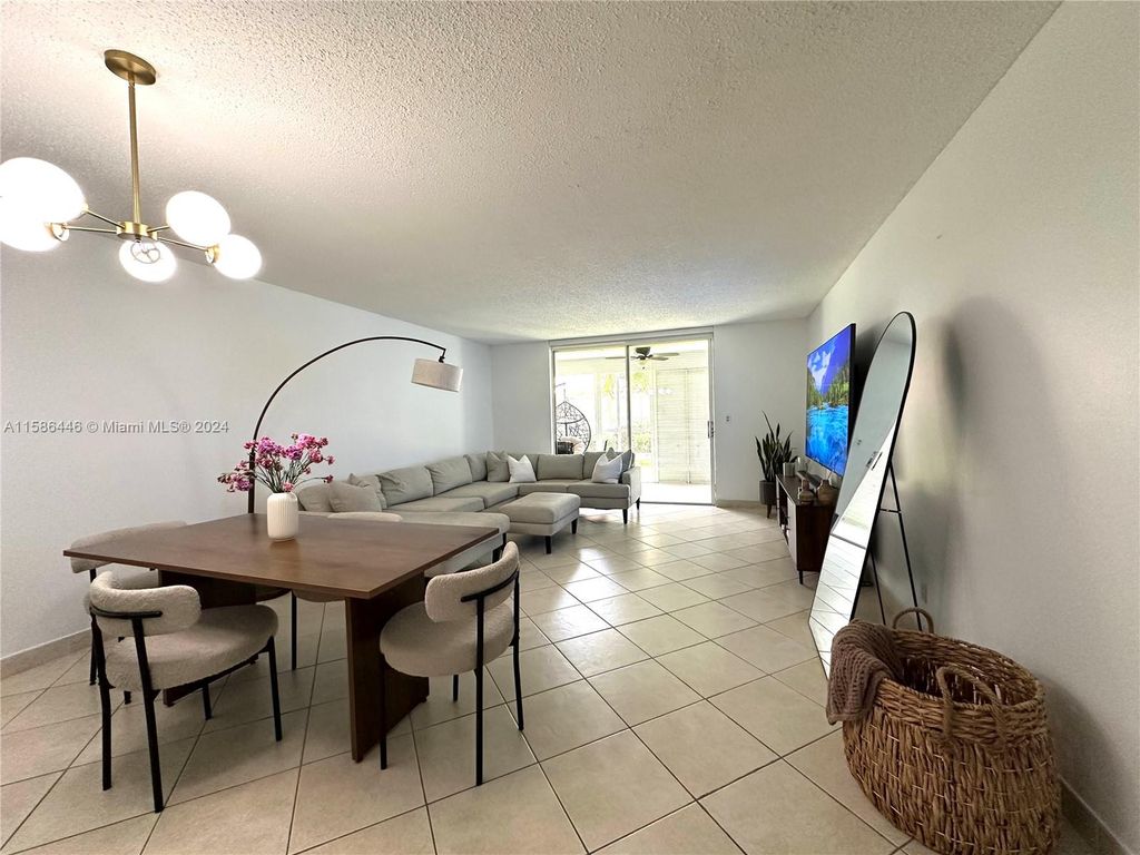 Photo of 620 NE 12th Ave #102, Hallandale Beach, FL 33009 (MLS # A11586446)