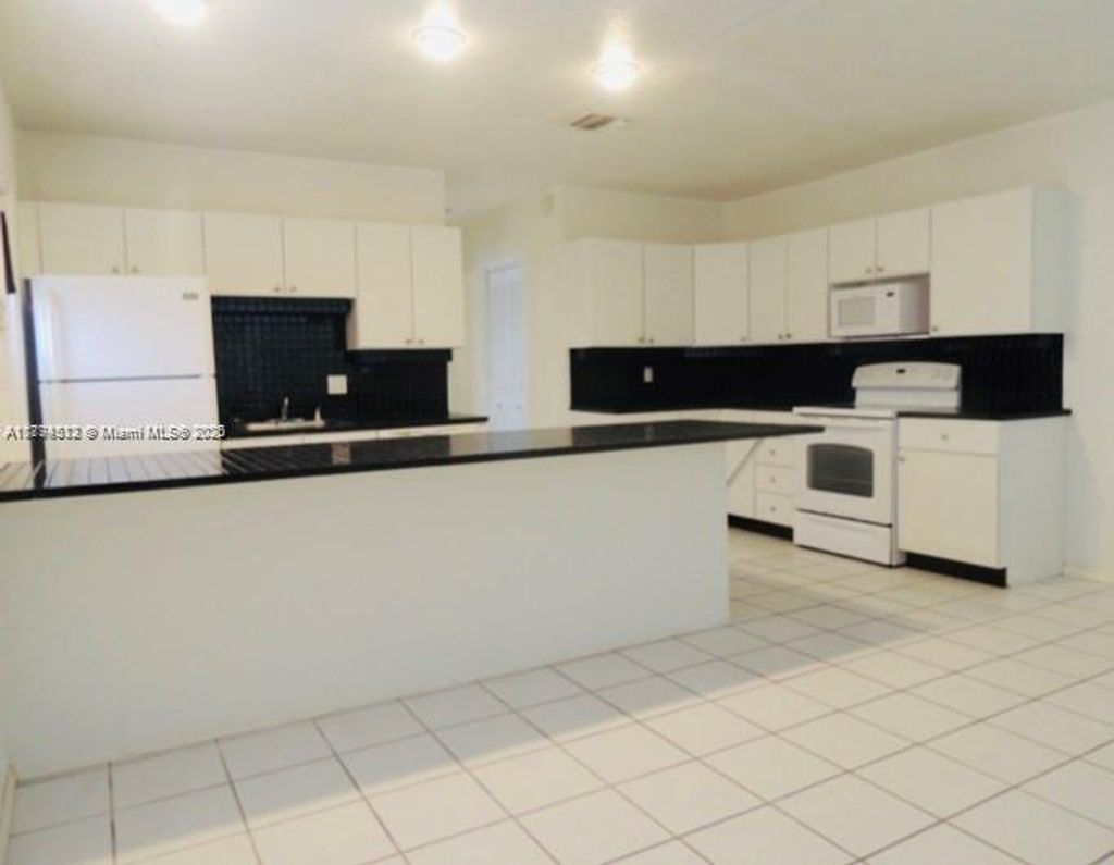 Photo of 1104 NE 17th Ter #1-2, Fort Lauderdale, FL 33304 (MLS # A11794512)