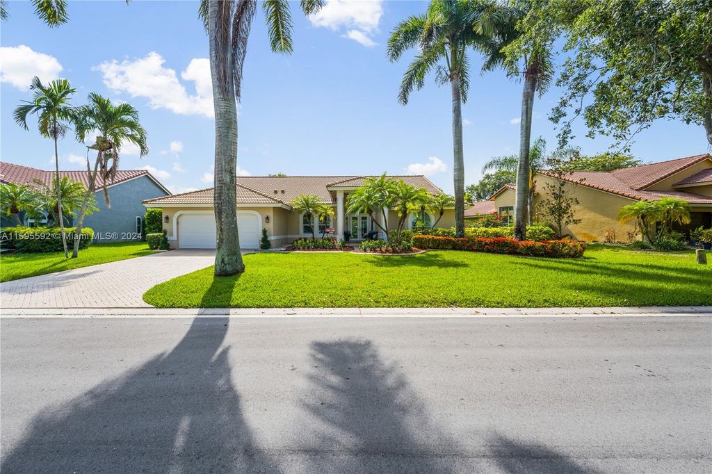 Photo of 5443 NW 107th Ave, Coral Springs, FL 33076 (MLS # A11595592)