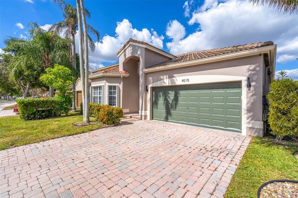 Photo of 4015 NW 62nd Dr, Coconut Creek, FL 33073 (MLS # A11965556)