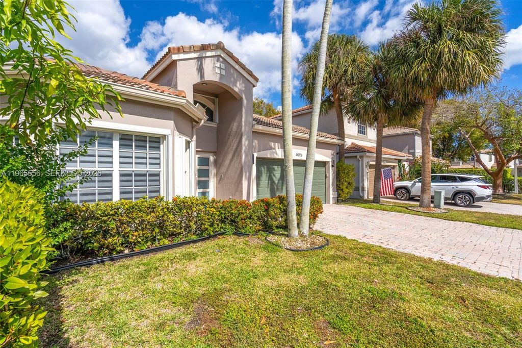 Photo of 4015 NW 62nd Dr, Coconut Creek, FL 33073 (MLS # A11965556)