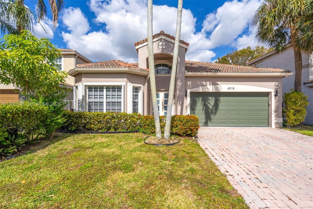 Photo of 4015 NW 62nd Dr, Coconut Creek, FL 33073 (MLS # A11965556)