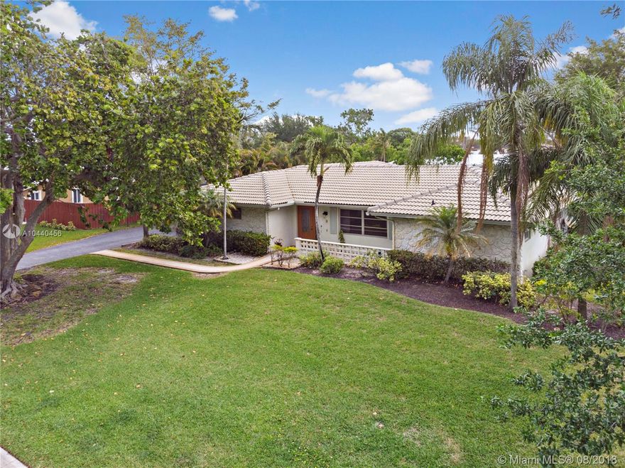 WOW! 4 Bed, 2 Bath+ Office , Pool Home On Large Oversized Lot In The Heart of Coral Springs CC (Almost ½ acre), "NO HOA".  Relax & Enjoy The Fenced Yard With Mature Landscape. Lots Of Room To Entertain. Wood Flooring, Laminate And Tile Floors. Open, Eat In Kitchen With Pass Through To Screened Patio. French Doors In Master Bedroom, Dining Room & Family Room All Leading To Patio. Master Bedroom Suite Features 2 Closets, Upgraded Bathroom With Double Sinks, Wood Cabinets & Granite Countertops. Split Floor plan. Hall Bath Has Double Sinks. Large Utility Room / Office Has Newer Washer & Dryer. Hurricane Shutters. Priced To Sell Must See!