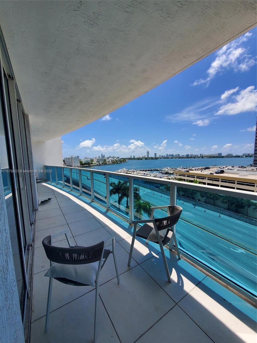 Owner say sell!! Drastically reduced for a quick sale!! This Beautiful condo with million dollars views! Floor to ceiling hurricane proof windows and sliding doors. Recent remodel done by designer. 2 beds and 2 Baths! Washer and dryer inside condo, w storage space. Building with front Desk, Gym, Pool, BBQ area, etc. 1 assigned very good parking spot, more can be rented directly from management. Way cheaper than a studio on future development across the street, that is not waterfront...