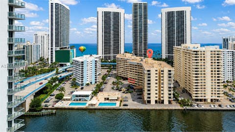 Photo of 1817 S Ocean Dr #215, Hallandale Beach, FL 33009 (MLS # A12059404)