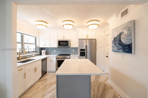 Photo of 1817 S Ocean Dr #215, Hallandale Beach, FL 33009 (MLS # A12059404)