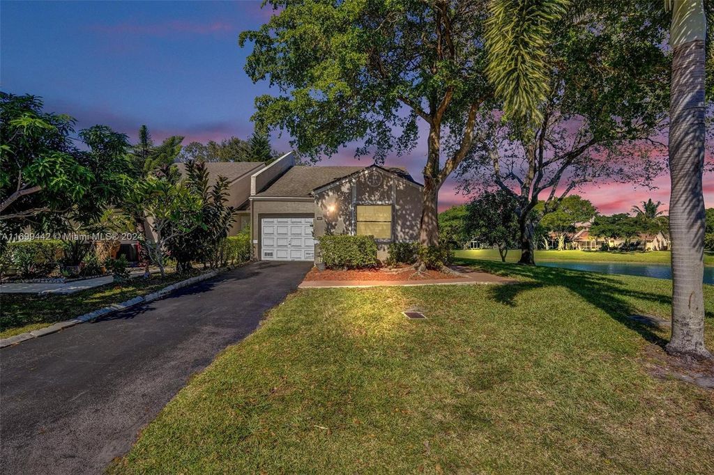 Photo of 5169 NW 11th Ln, Deerfield Beach, FL 33064 (MLS # A11699442)