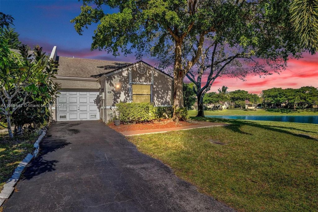 Photo of 5169 NW 11th Ln, Deerfield Beach, FL 33064 (MLS # A11699442)